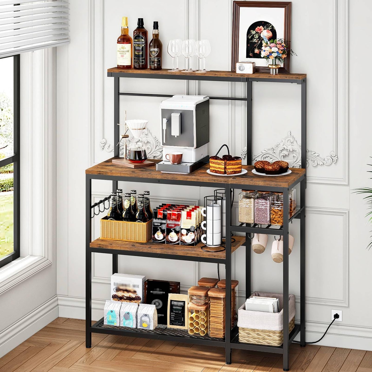 Multi-tiered shelving unit with kitchen items in a room with a window.