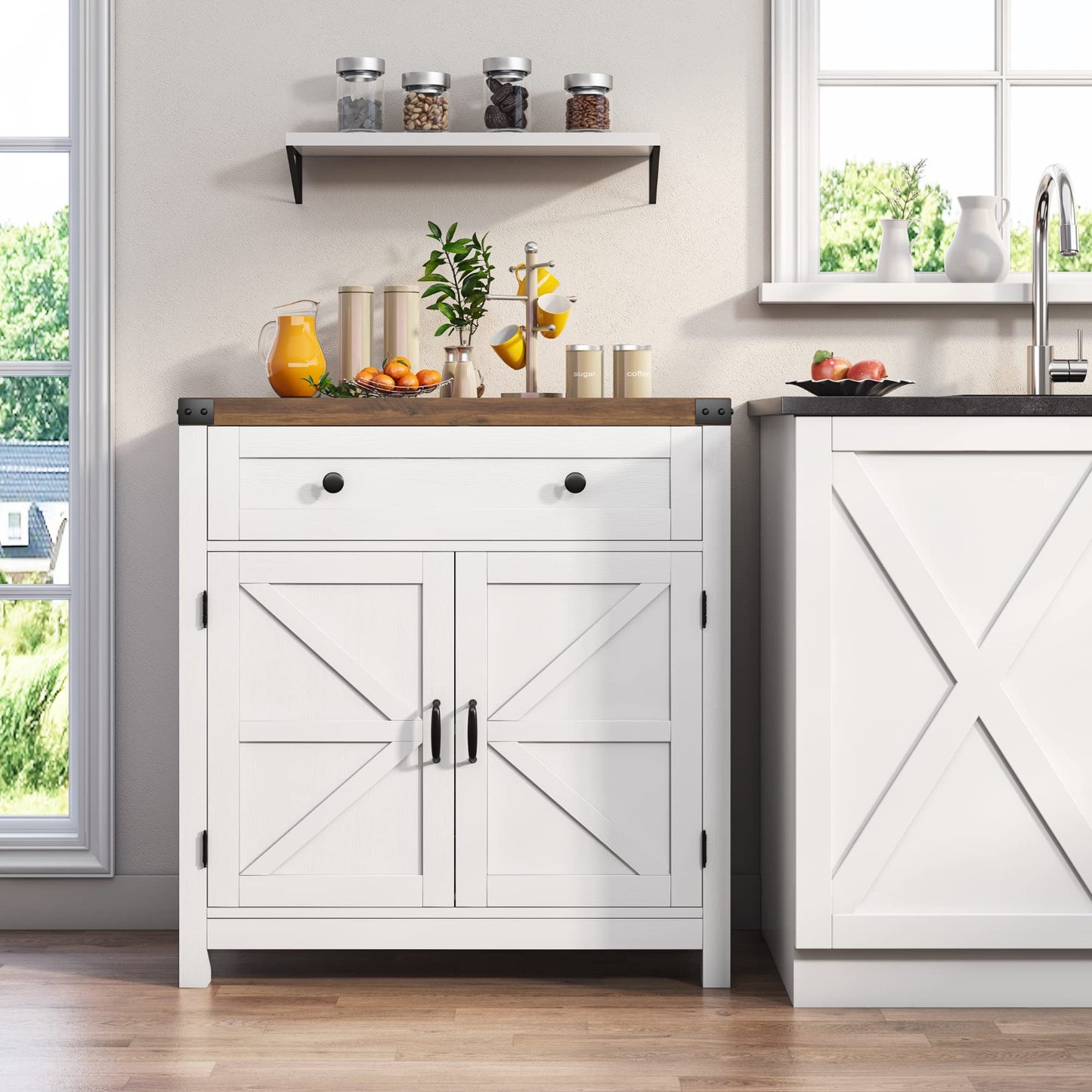 Modern kitchen with white cabinets, wooden countertop, and natural light.