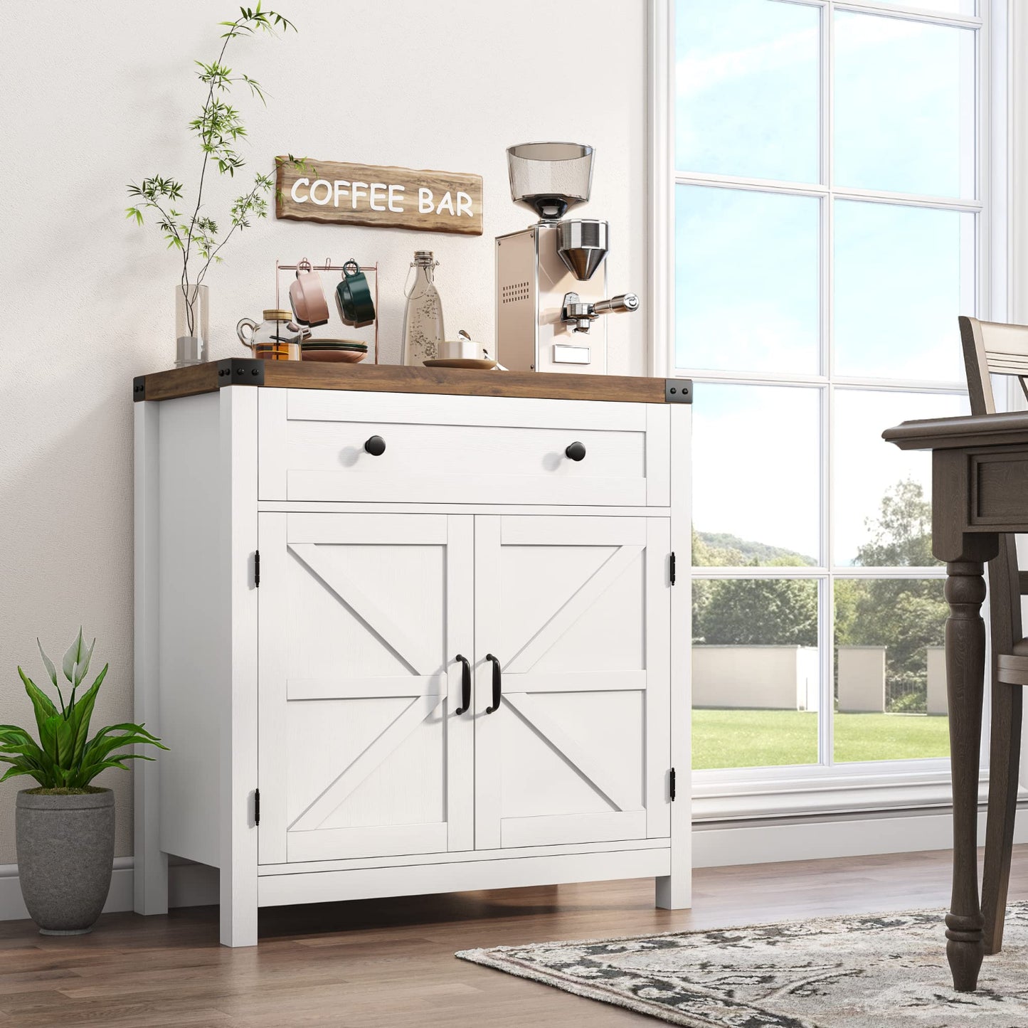 White kitchen cabinet with wooden top near a window with a view of greenery