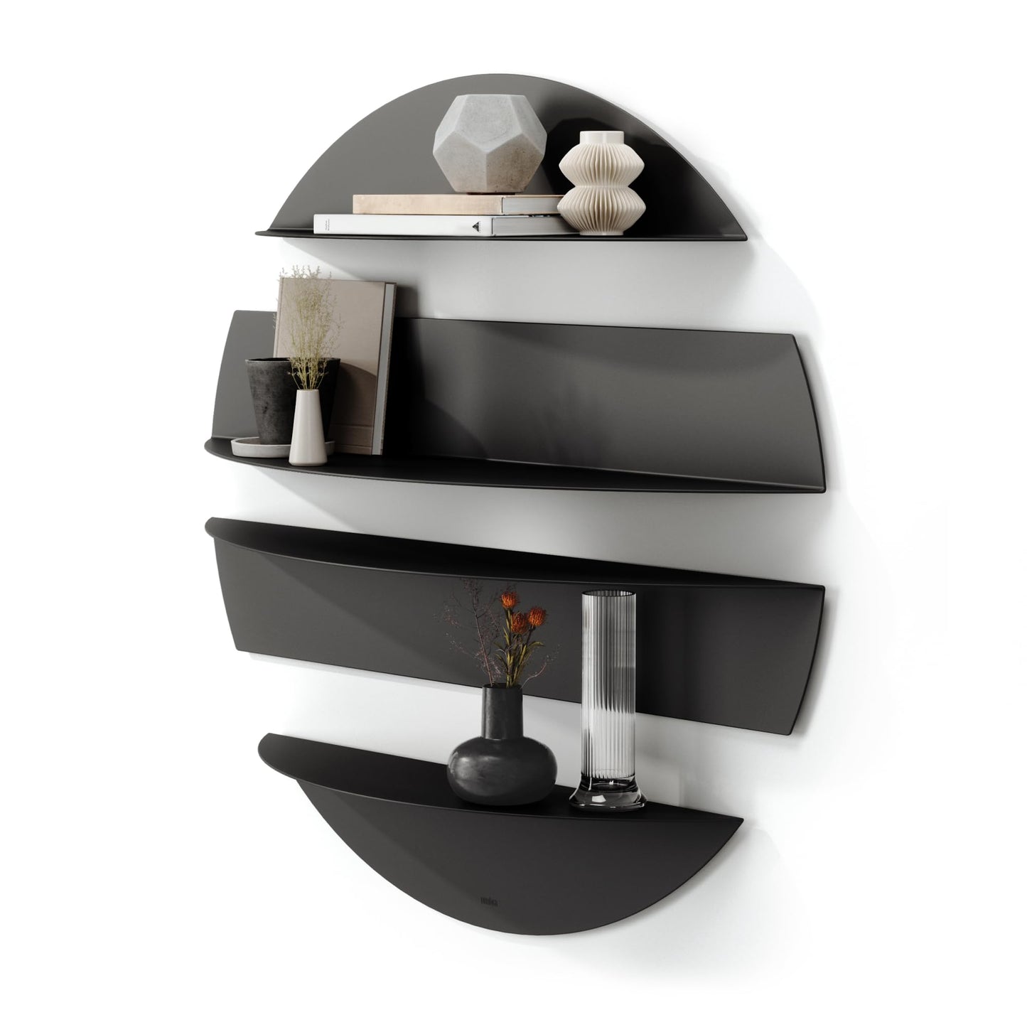 Modern black wall shelf with decorative items on a white background