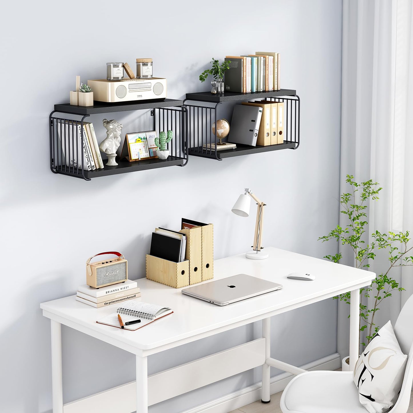 White desk with black metal shelves against a light gray wall.