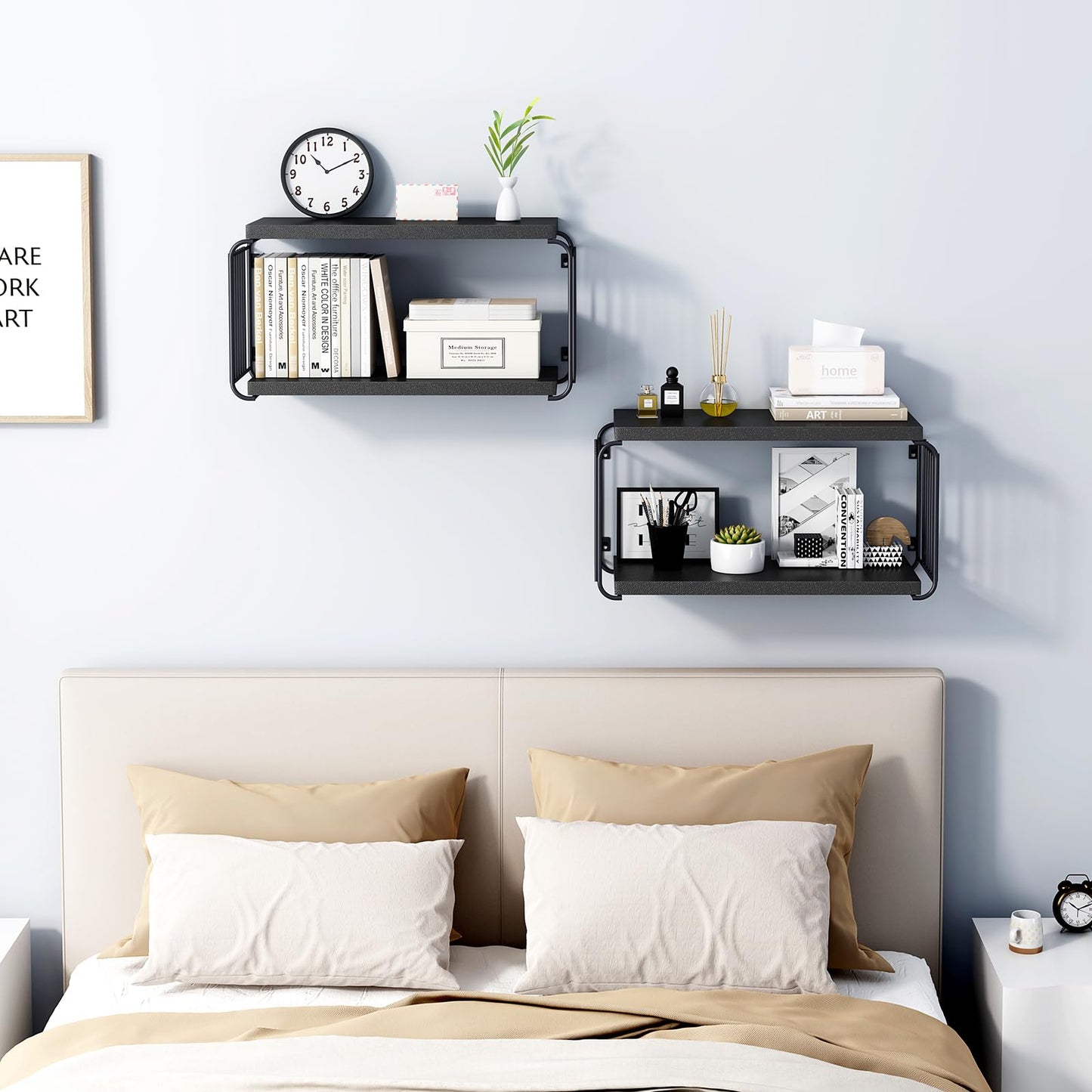 Black wall shelves above a bed with decorative items against a light blue wall.