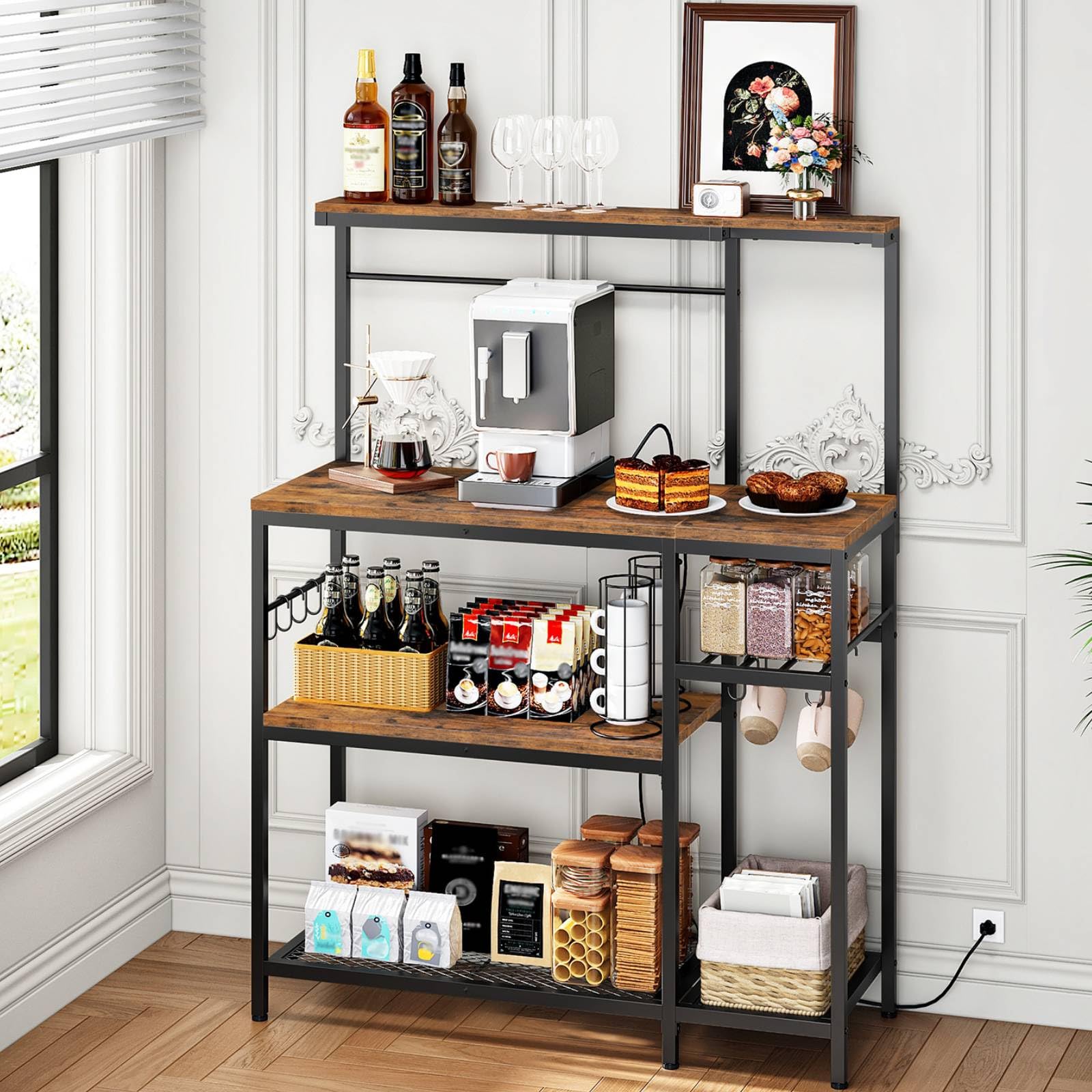 Multi-tiered shelving unit with kitchen items in a room with a window.