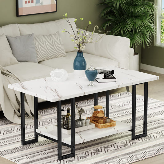 Living room with a white sofa, marble coffee table, and decorative items.
