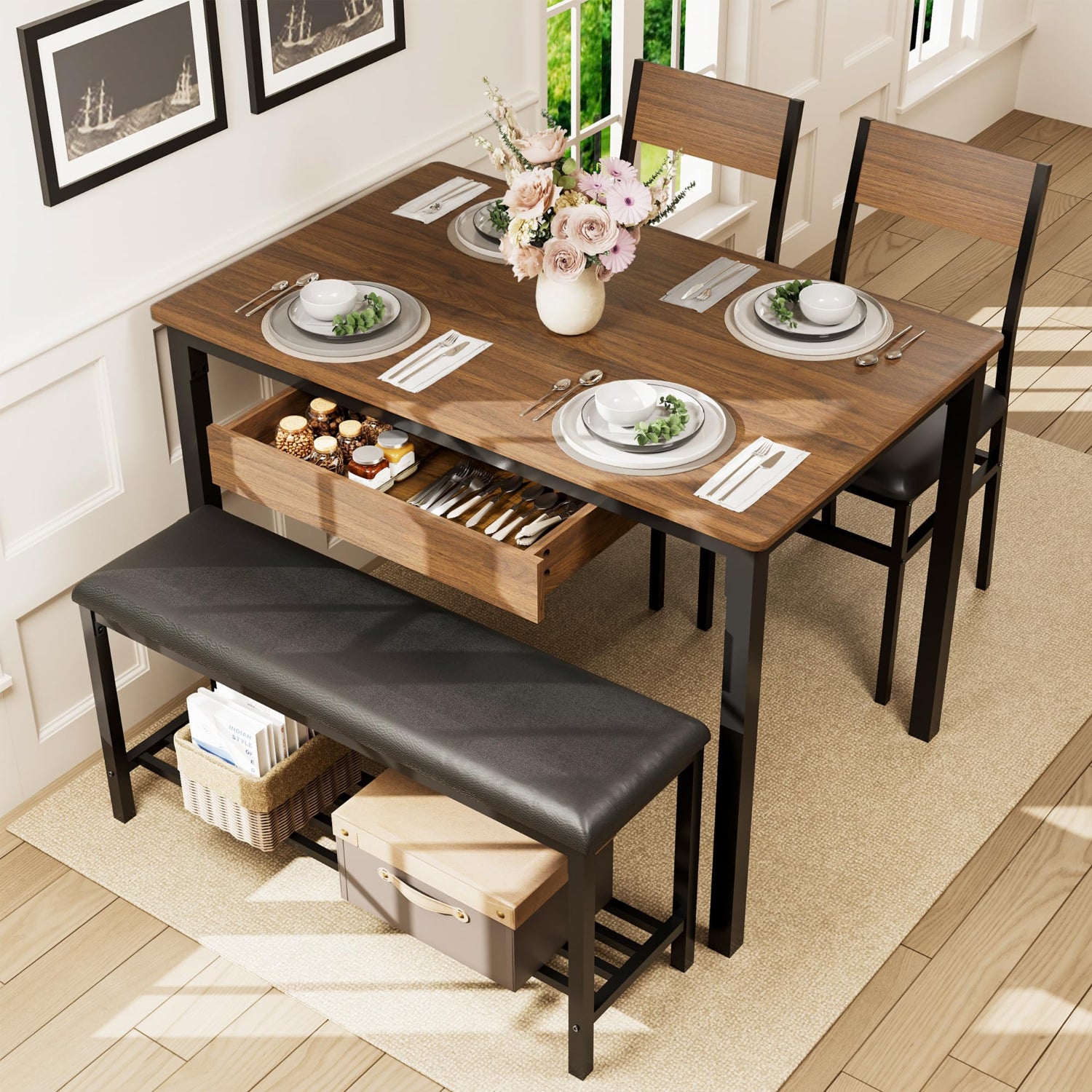 Dining table set with chairs, bench, and tableware in a room with large windows.