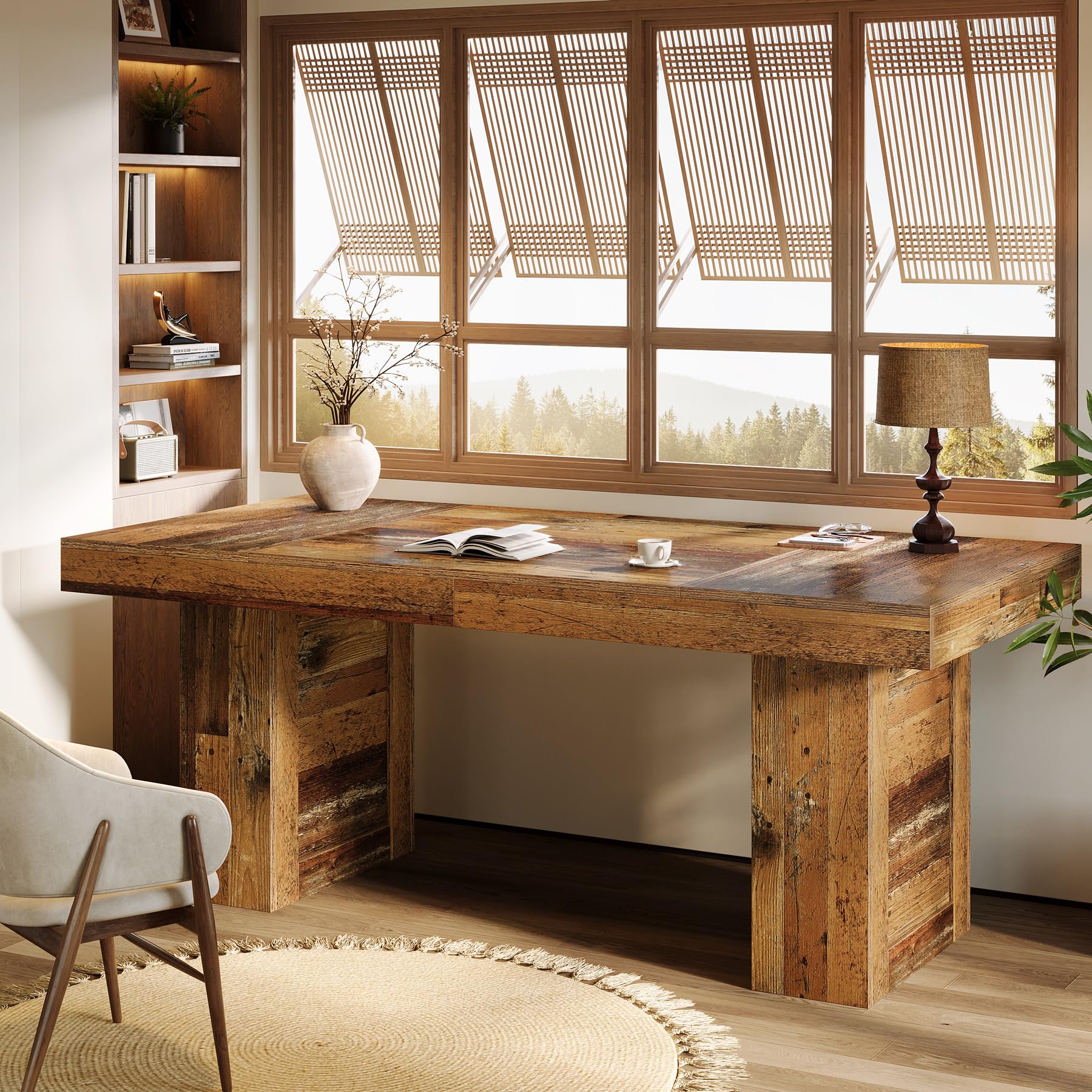Wooden desk in a home office with large windows and a chair.