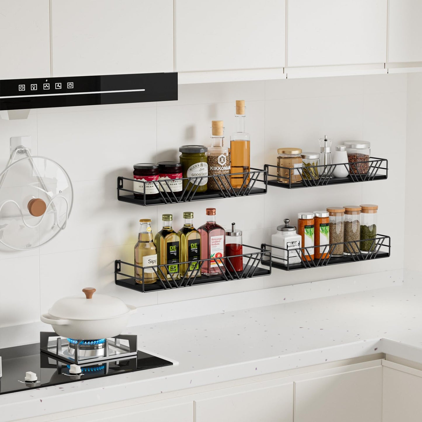 Black metal wall-mounted shelves with kitchen items in a modern kitchen setting.