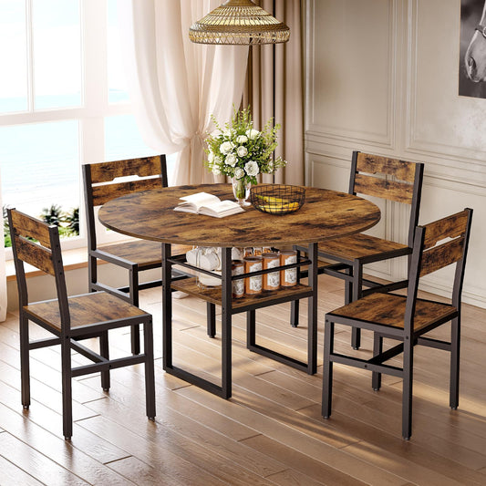 Dining room set with round wooden table and four chairs in a well-lit room.