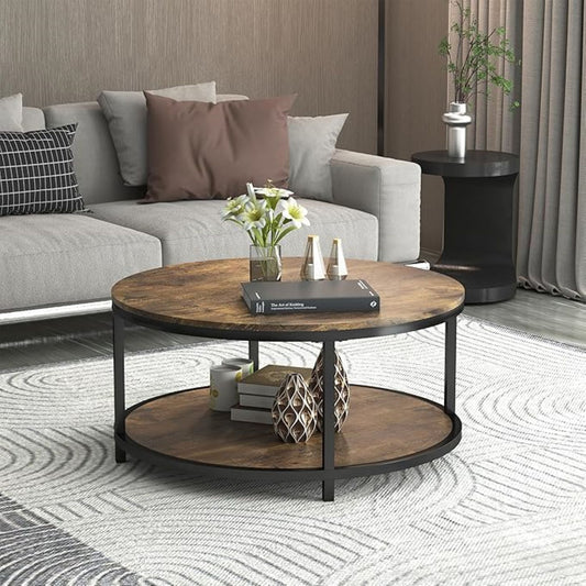 Round wooden coffee table with metal legs in a living room setting.