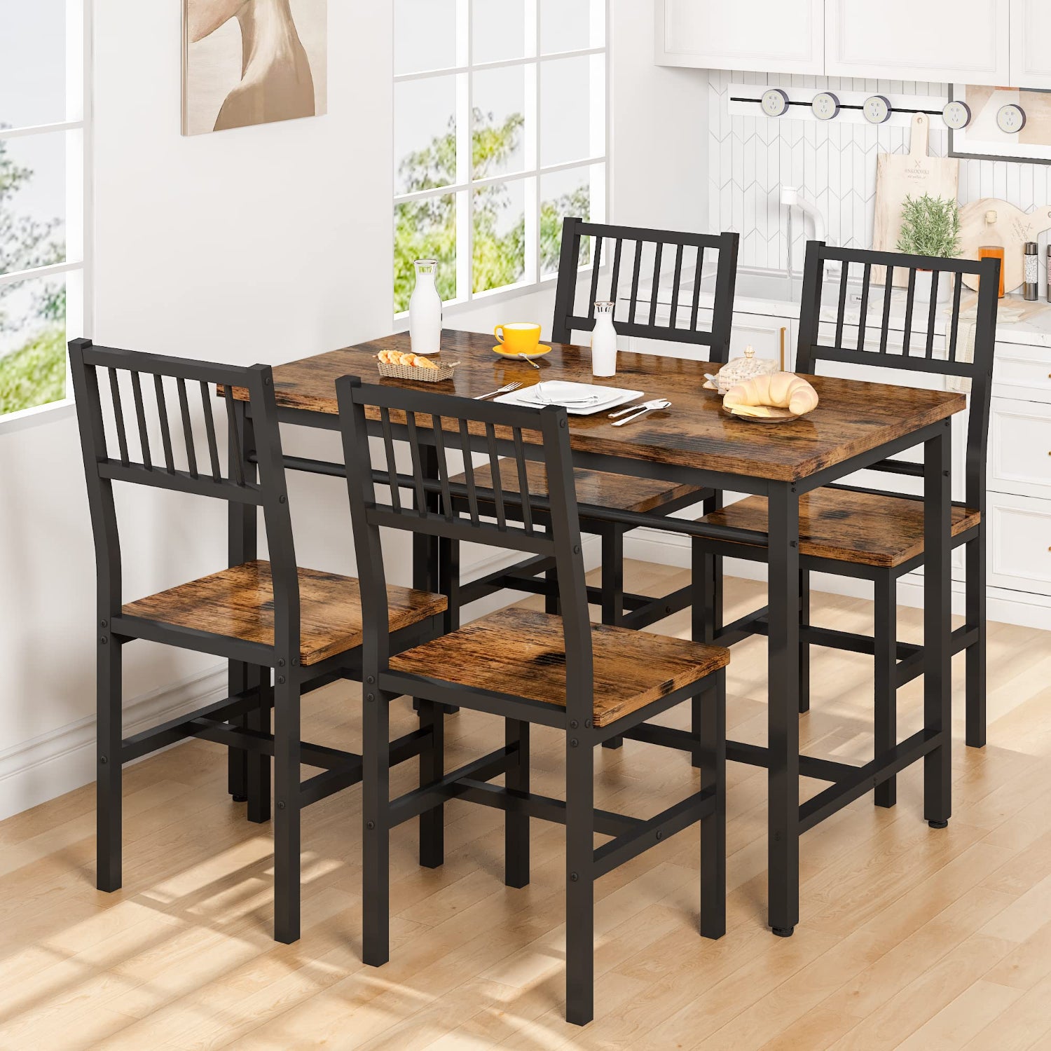 Dining table set with four chairs in a bright room