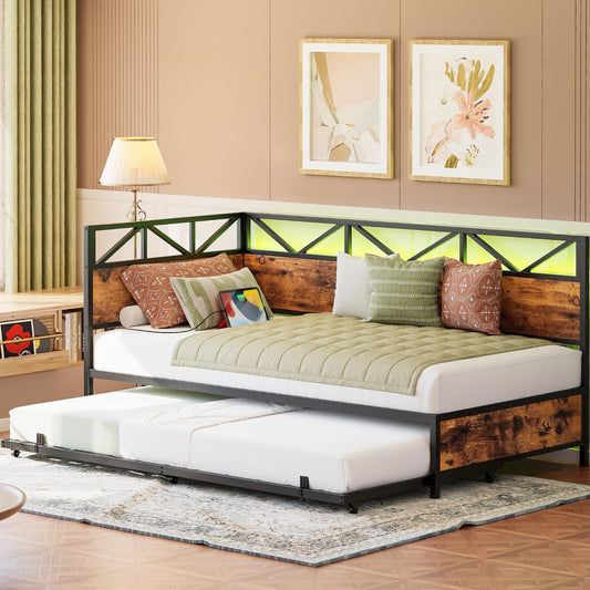 Bedroom with a trundle bed extended, pillows on top, and framed artwork on the wall.