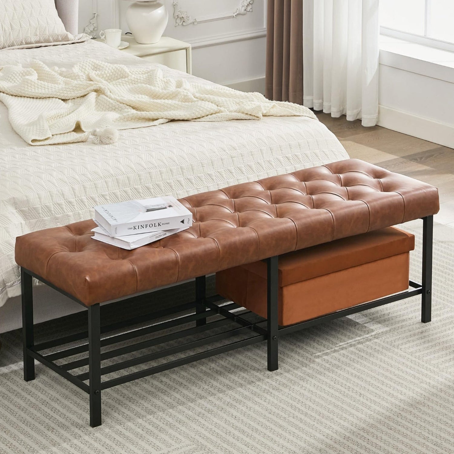 Brown tufted bench with storage in a bedroom setting