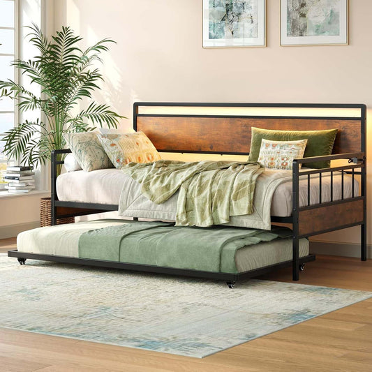 Bedroom with a wooden bed frame, green bedding, and decorative pillows.